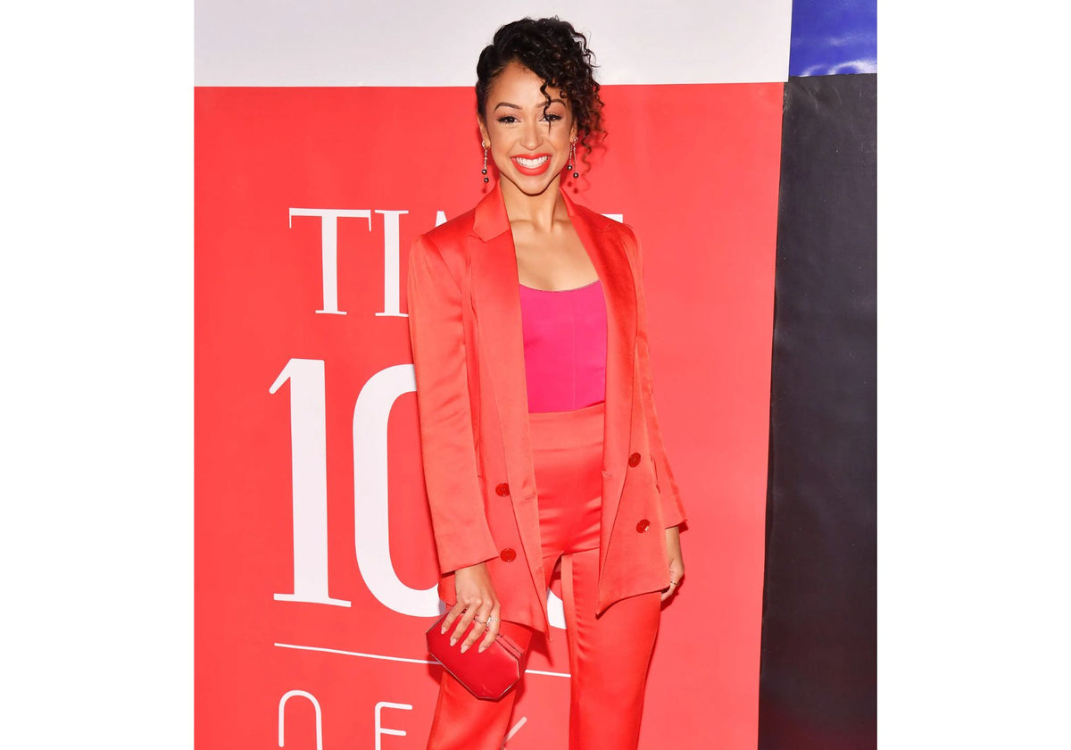 Liza Koshy on the Time 100 red carpet wearing AMANDA PEARL ripple rings.