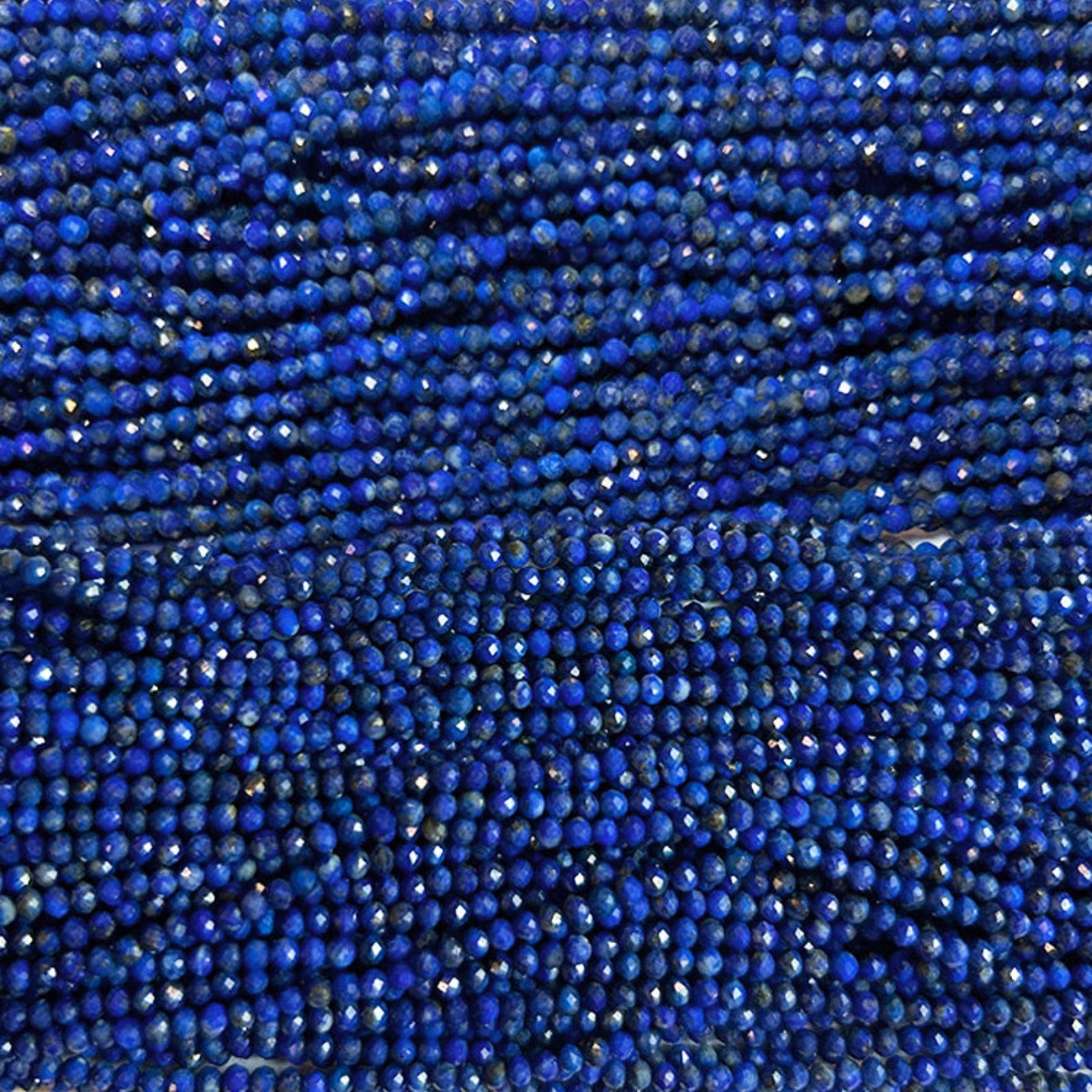 Shimmering slim gemstone beaded necklace made of 2mm faceted stones in Lapis swatch