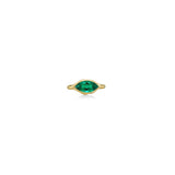 A 14K yellow gold marquise ring, with a bezel set faceted emerald gemstone, sits on a white background with drop shadow.