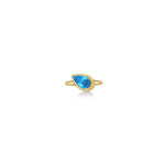A 14k yellow gold molten solitaire ring with pear-shaped blue topaz on a white background.