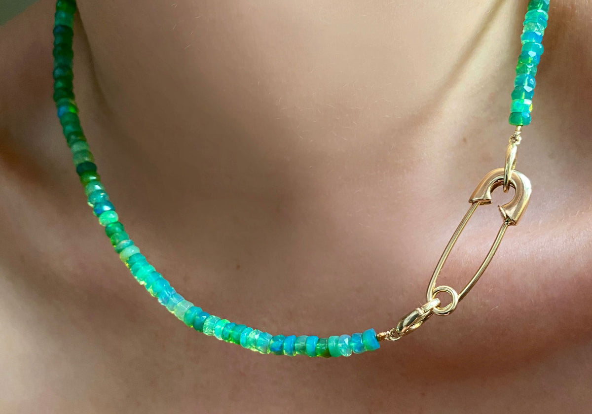 Green faceted opals with a 14k gold Safety Pin charm lock.