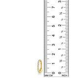 A 14K recycled yellow gold charm lock with lab grown diamonds from AMANDA PEARL sits against a ruler for scale. 