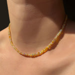Eclipse Opal Necklace hanging on the neck