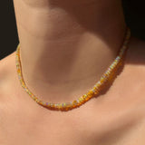 Eclipse Opal Necklace hanging on the neck