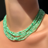 AMANDA PEARL a stack of Faceted Chrysoprase Necklaces on Sterling Silver Evolution Clasp on a model's neck.