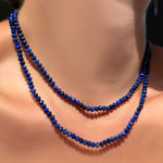 2 AMANDA PEARL Faceted Lapis Necklaces on Recycled Sterling Silver Evolution Clasps layered on a model's neck.