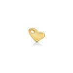A 14K recycled yellow gold molten heart charm from AMANDA PEARL, sits back facing on a white background with drop shadow.