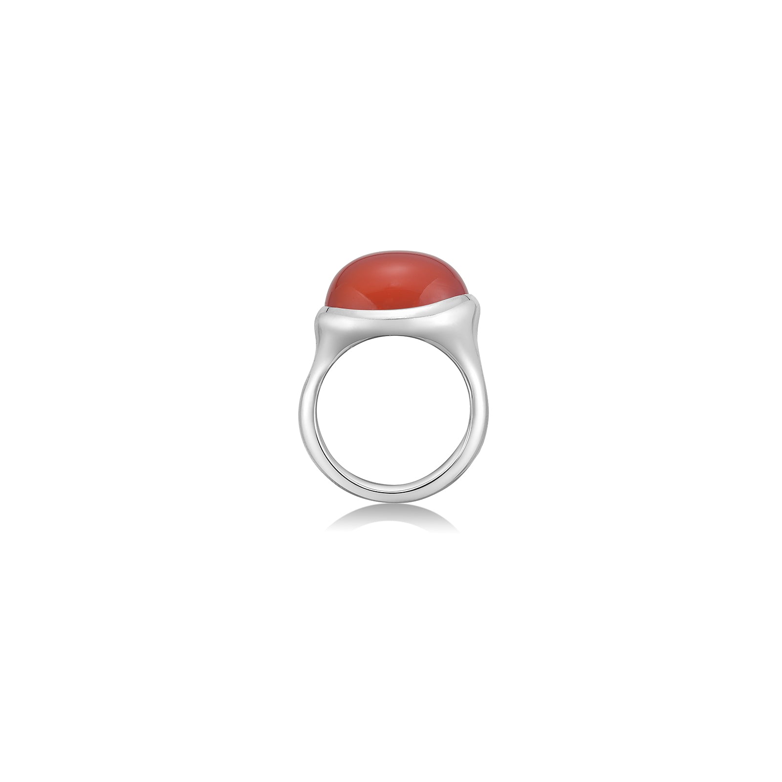 A molten pebble ring cast in recycled sterling silver with a carnelian stone from AMANDA PEARL sits on a white background with drop shadow.
