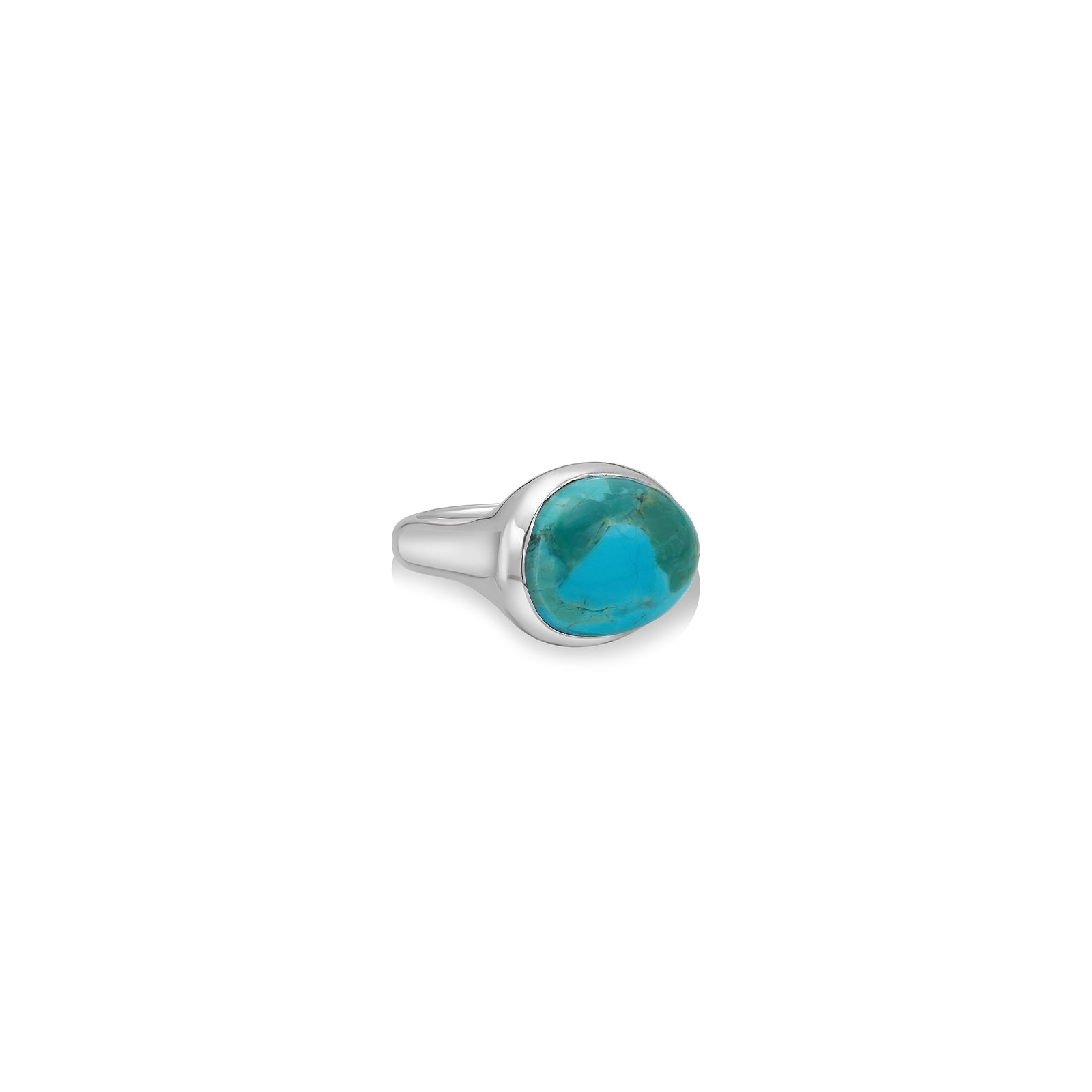 A molten pebble ring cast in recycled sterling silver with a turquoise stone from AMANDA PEARL sits on a white background with drop shadow.