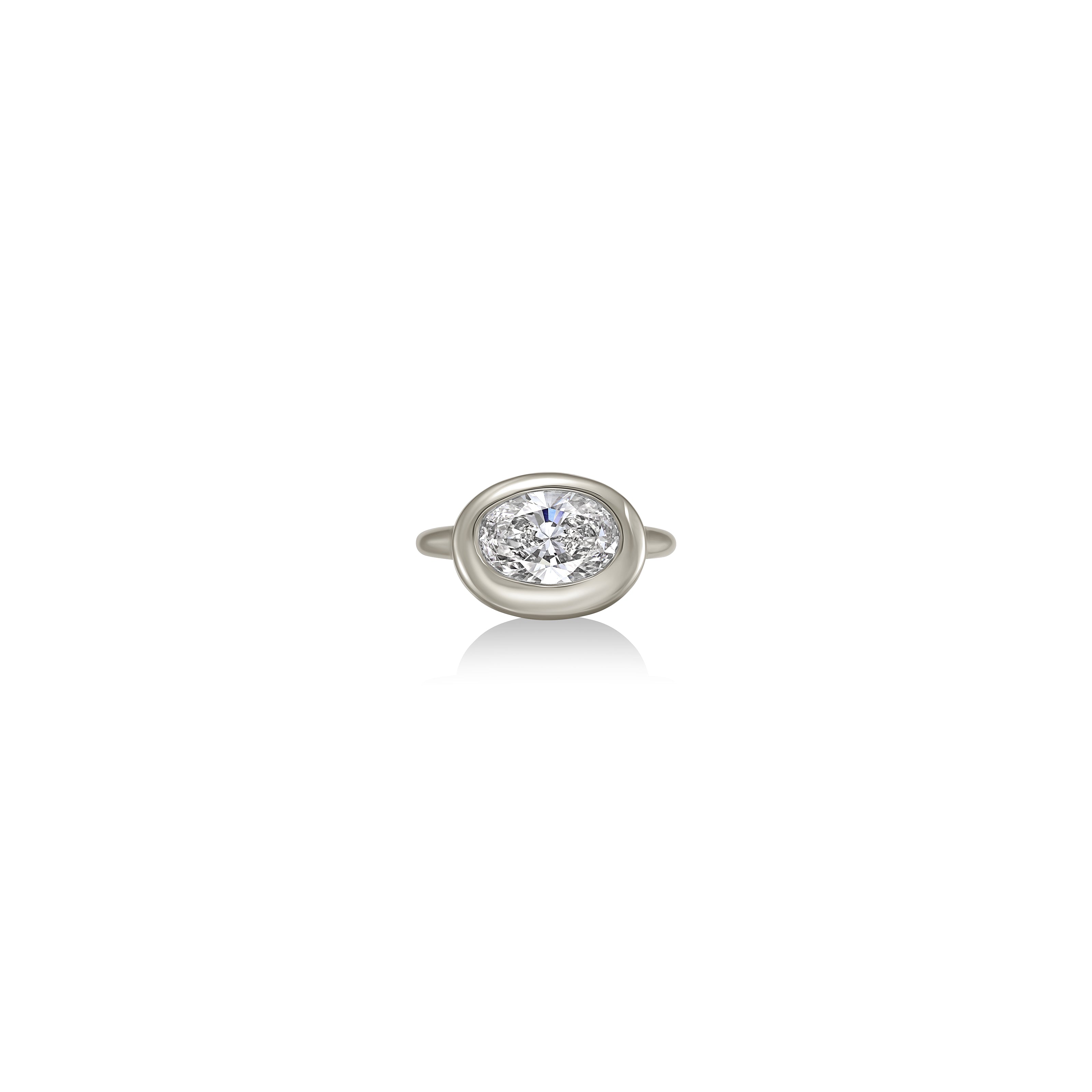 front view oval molten diamond solitaire ring in white gold against a white background