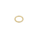 A 14K recycled yellow gold molten wedding band from AMANDA PEARL sits on a white background.