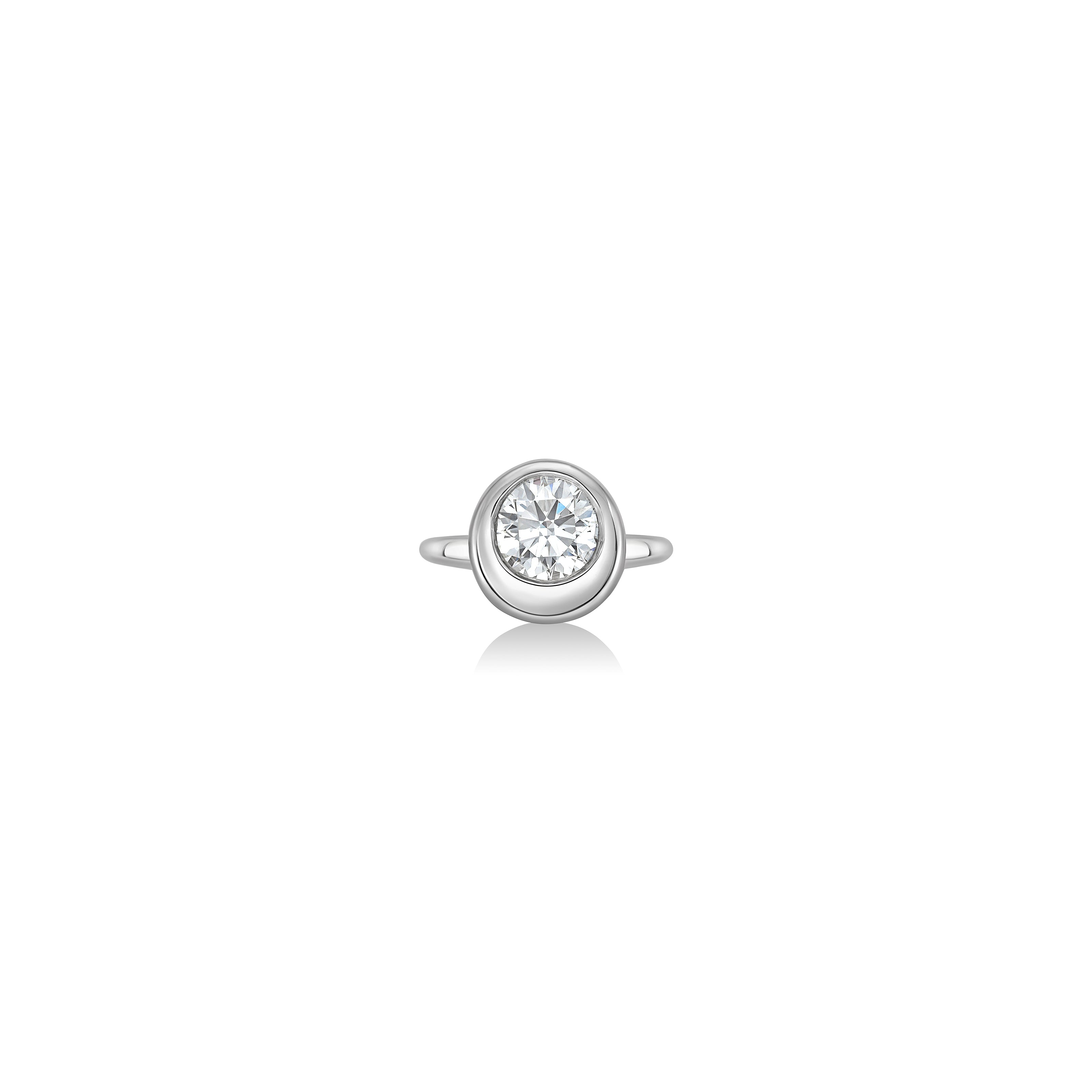 front view of round molten solitaire ring in white gold against a white background
