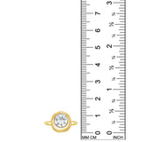 front view of round molten solitaire ring in yellow gold against a white background next to a ruler