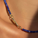 14k recycled yellow gold Pavé Oval Charm Lock styled with on a neck locked onto the Ultramarine Faceted Opal Necklace
