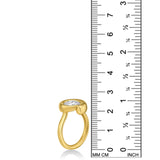 Quill Bezel Ring in yellow gold - against a ruler on a white background.
