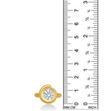 Quill Bezel Ring top view in yellow gold - against a ruler on a white background.