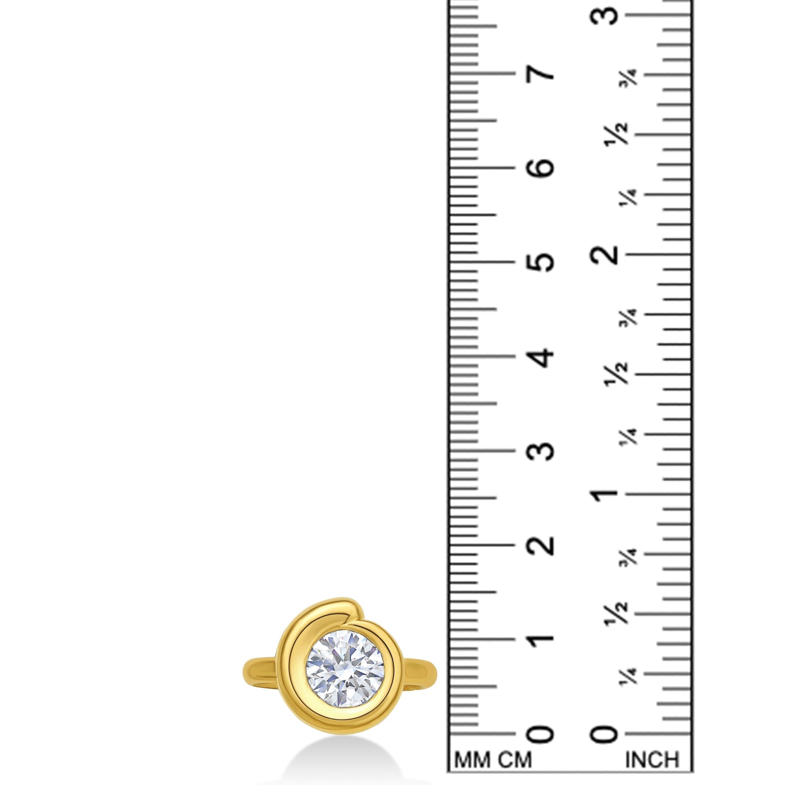 Quill Bezel Ring top view in yellow gold - against a ruler on a white background.