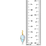 A rainbow moonstone drop charm with a 14K yellow gold ripple bale stands against a ruler for scale. 