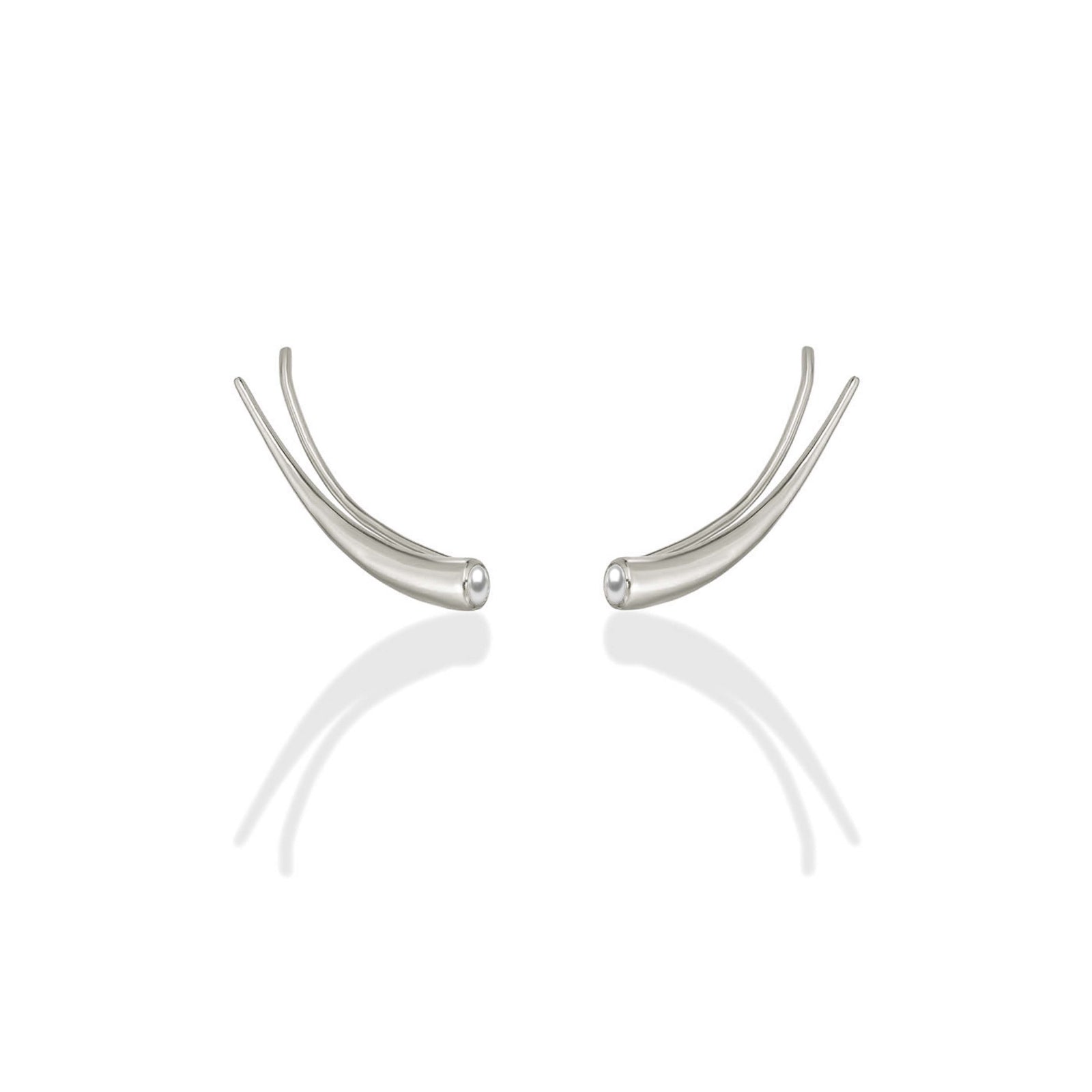 A pair of 14k recycled white gold curved climber earrings with a quill spike shape and a bezel set round pearl on a white background.