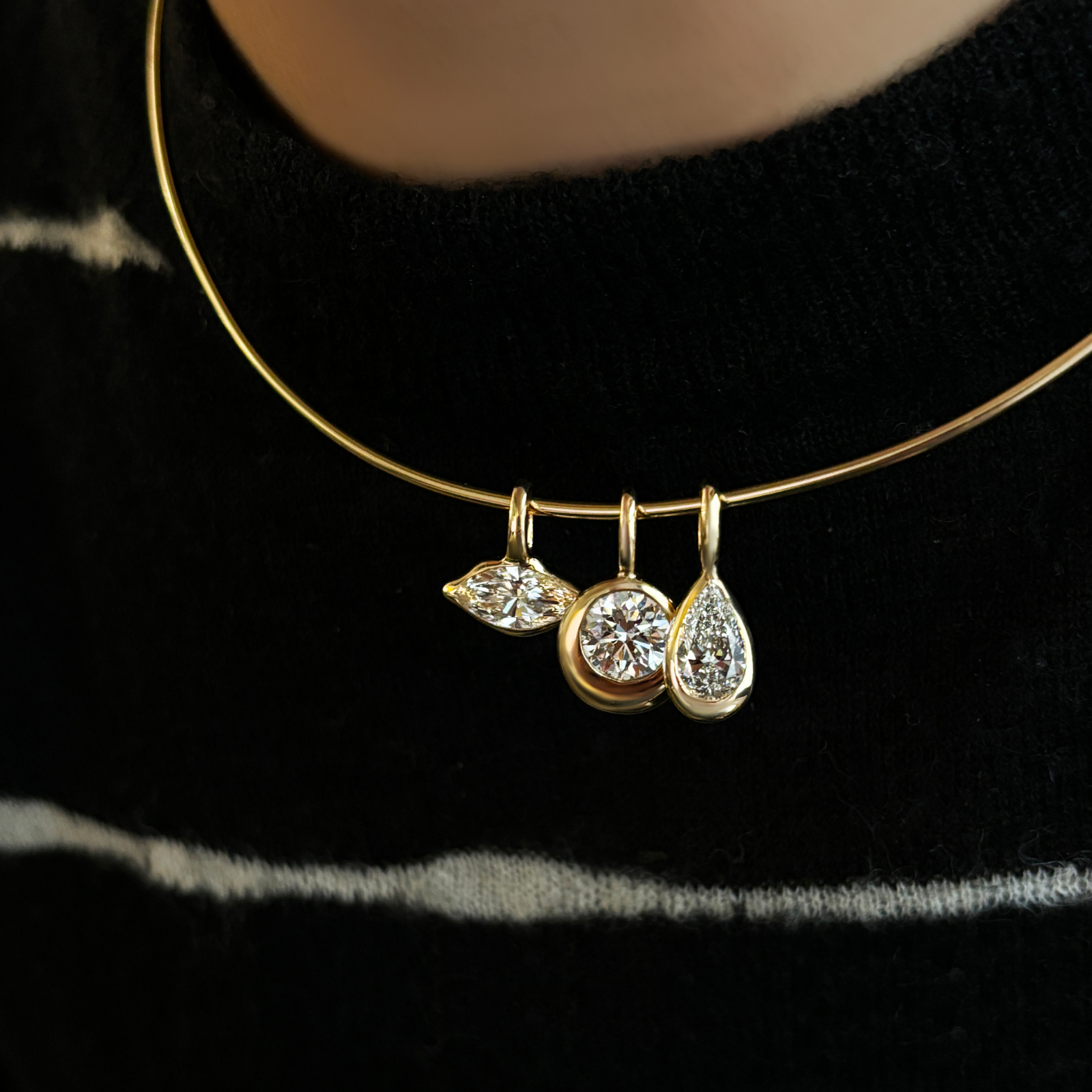 14K Recycled Gold Molten Round Solitaire Charm with Diamond accent layered on a wire choker with the Molten Marquise Solitaire Charm and Molten Pear Solitaire Charm