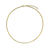 Adjustable omega chain in 14k yellow gold on a white background.