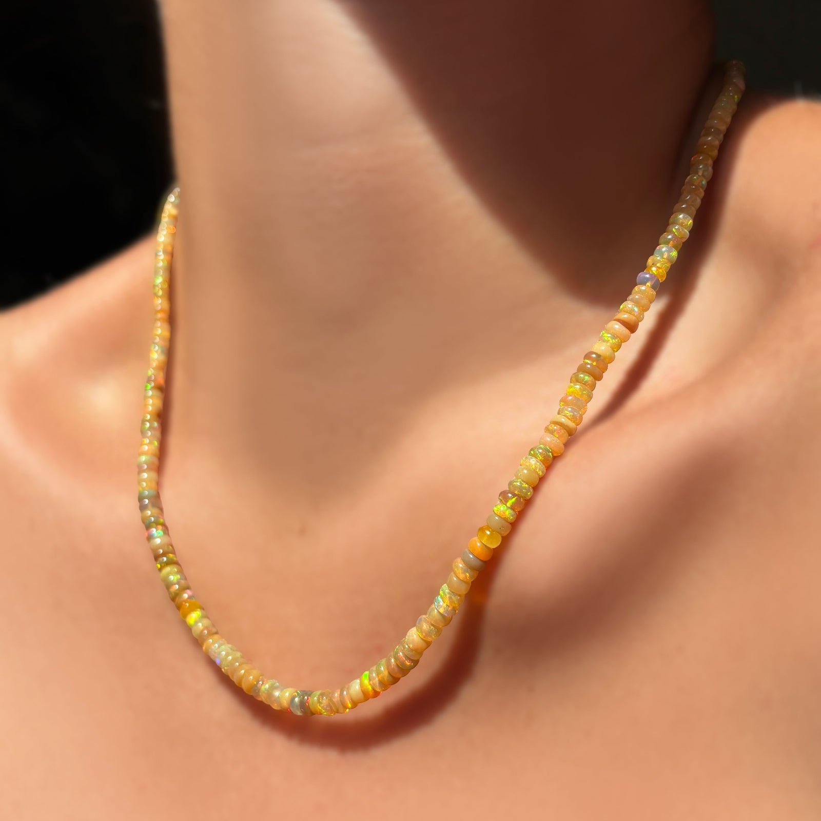 golden fall opals on a model's neck