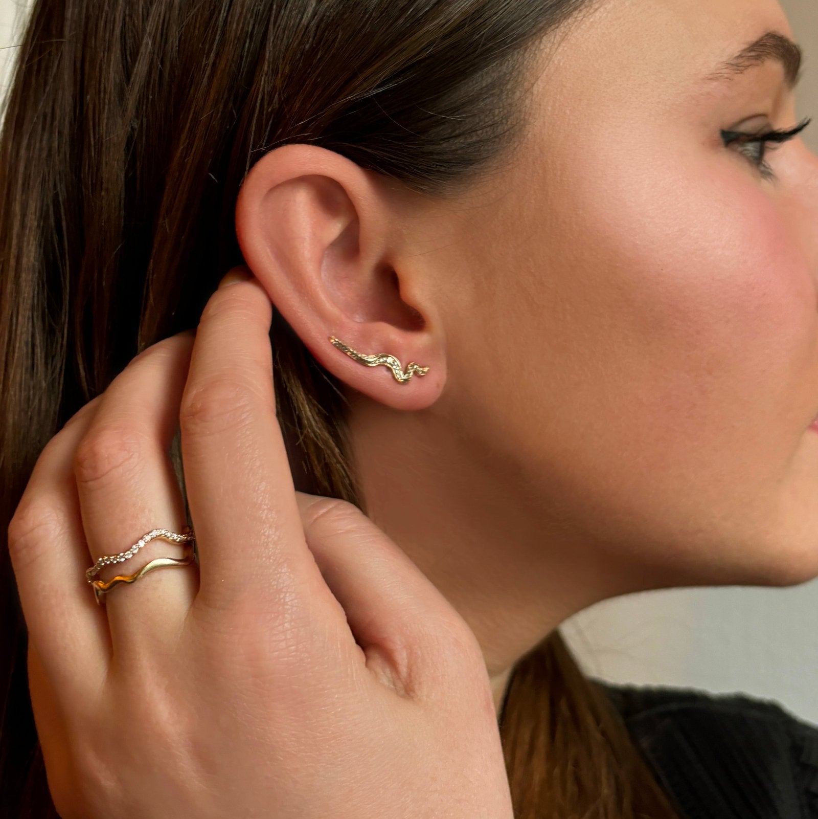 14k gold Full Pave Large Ripple Climber Earrings on an ear
