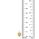 14K recycled Yellow Gold skull charm on white background with ruler measuring, 14mm tall