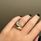 14K recycled gold Molten Ring styled on a hand stacked with the molten knot ring 