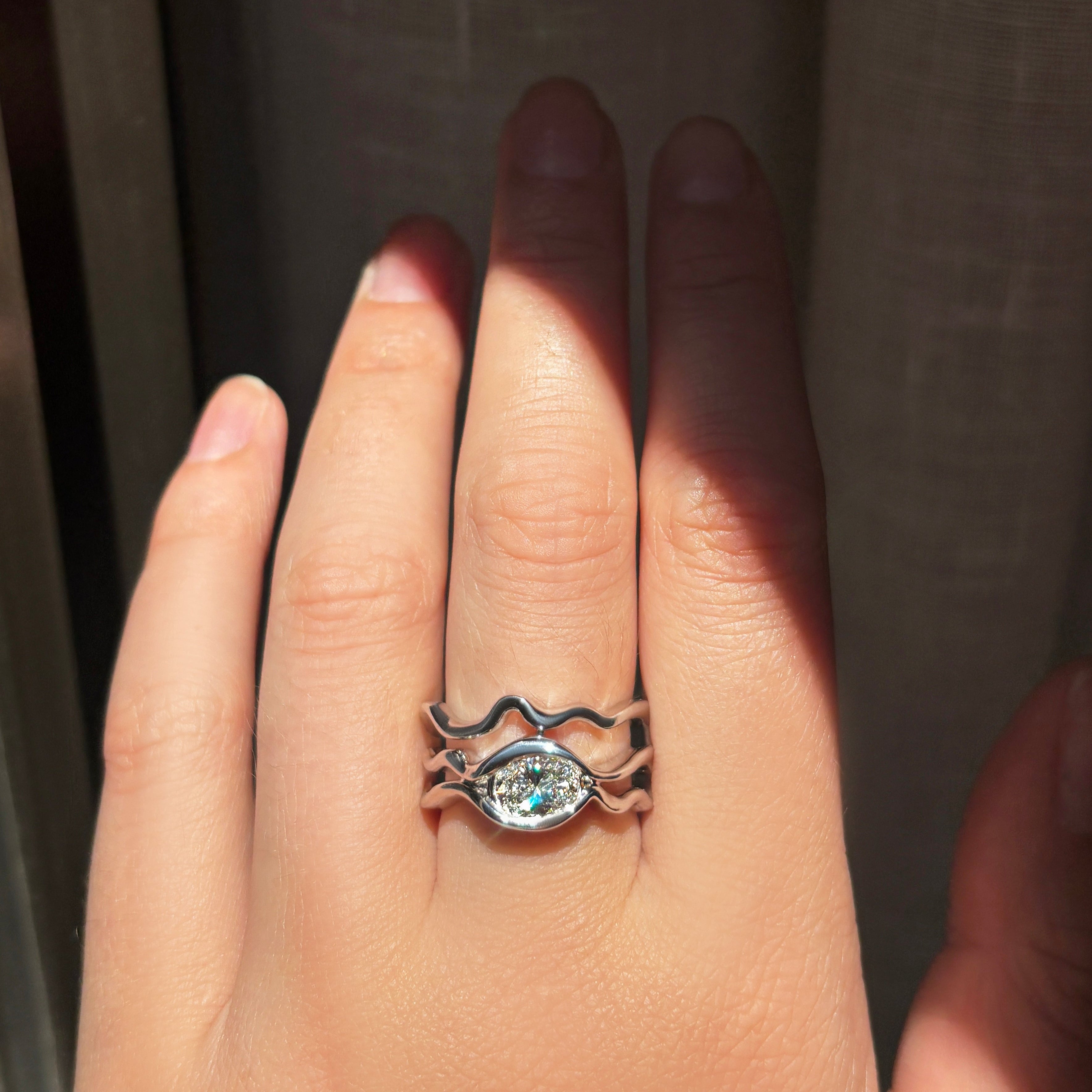 Multi Ripple Ring with Diamond in white gold worn on hand