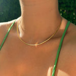 Omega 14K Gold Choker styled on body