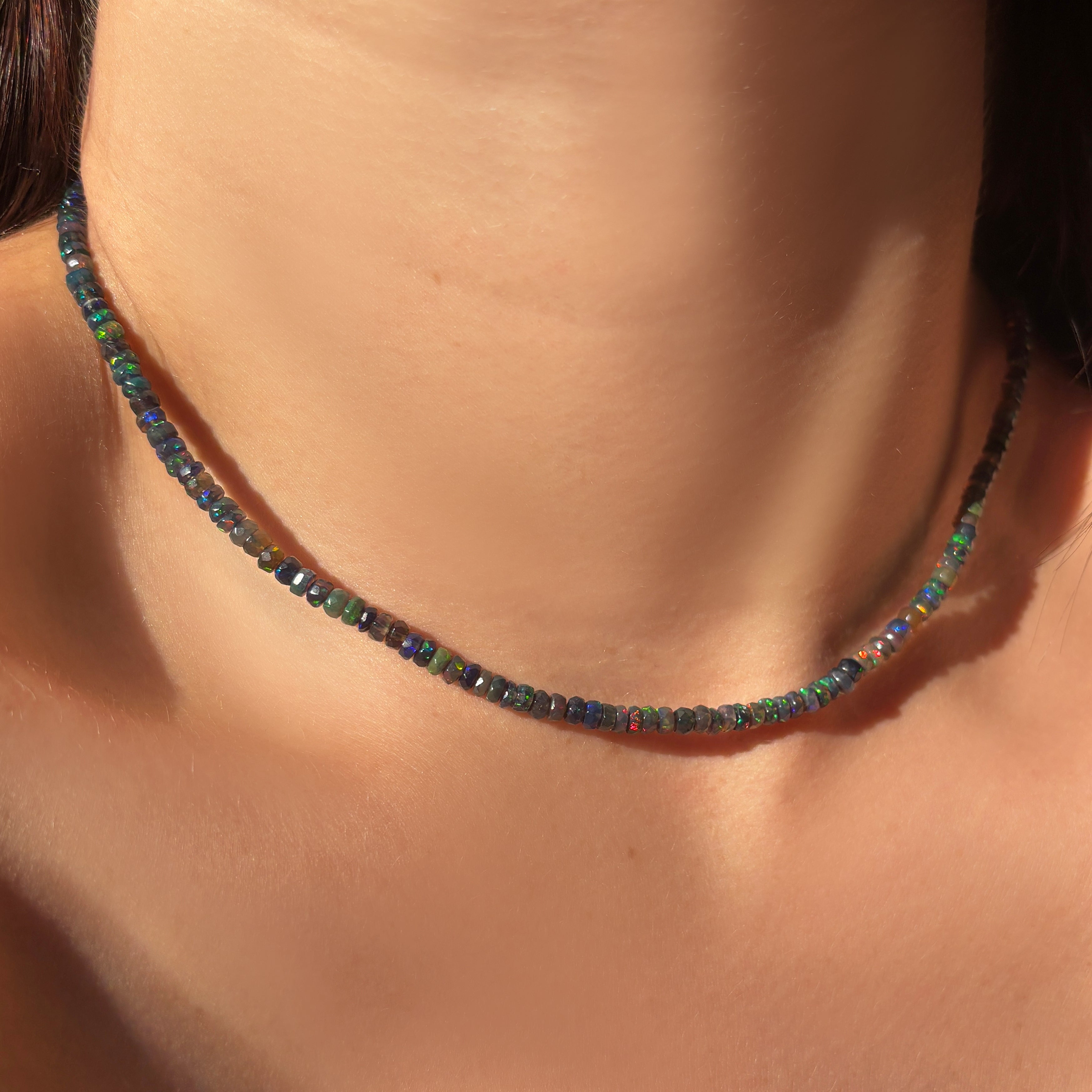 Small Black Faceted Opal Necklace layered alone styled on a neck
