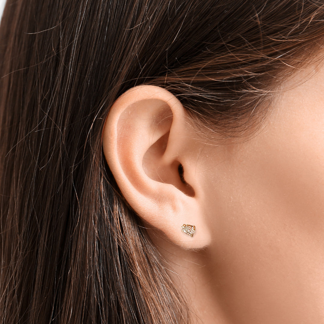 Close-up of an AMANDA PEARL Elements ethical diamond stud earring on a model's ear.