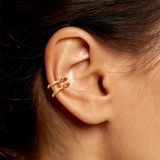 14k recycled gold Ripple Midi Ear Cuffs styled together side by side on a ear