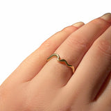 14k Recycled Yellow Gold Ripple Ring with a plain gold surface and a shape inspired by water.  