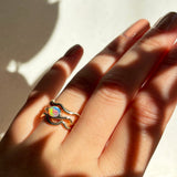14K Recycled yellow Gold Ripple Ring with a fiery Opal styled on a hand layered with plain yellow gold ripple rings. 

Fashion, Fashion Photography, Jewelry Design, Fashion Styles, Trends, Trendy, Lab Grown Diamonds, opals, engagement