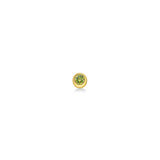 Molten solitaire stud with peridot against a white background.