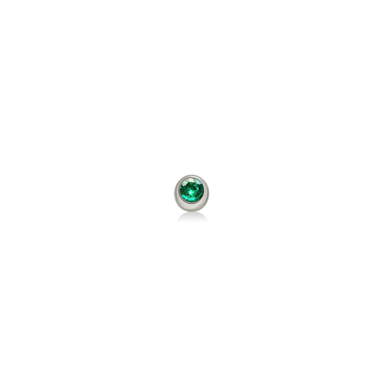 Molten solitaire stud earring in recycled 14k white gold with a round, cultivated emerald on a white background. 