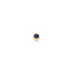 Molten solitaire stud earring in recycled 14k yellow gold with a round, cultivated sapphire on a white background. 