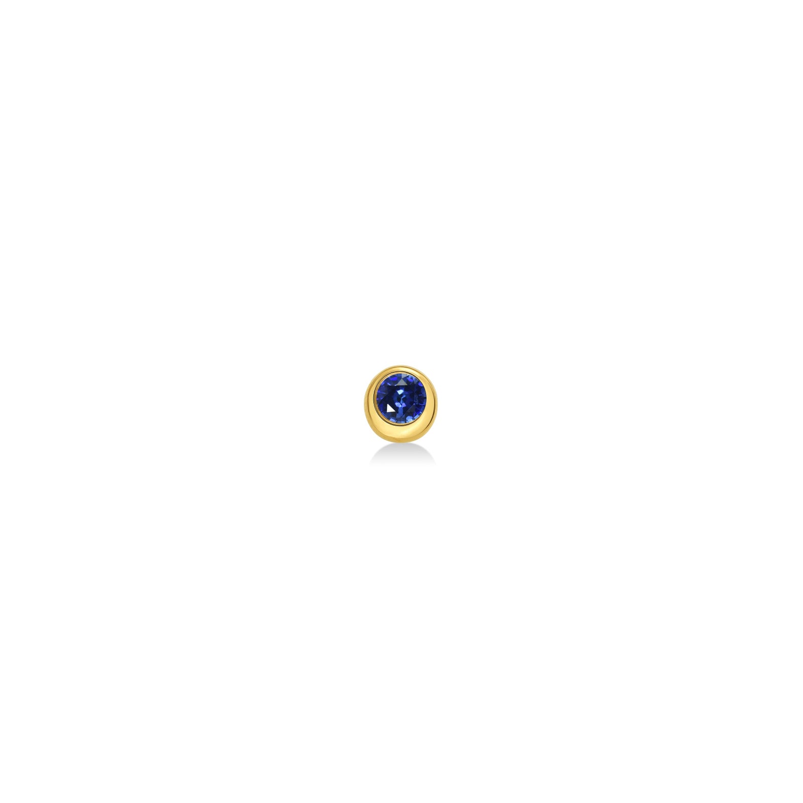 Molten solitaire stud earring in recycled 14k yellow gold with a round, cultivated sapphire on a white background. 