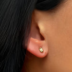 Liquid 14K recycled gold Small Molten Stud earring on ear