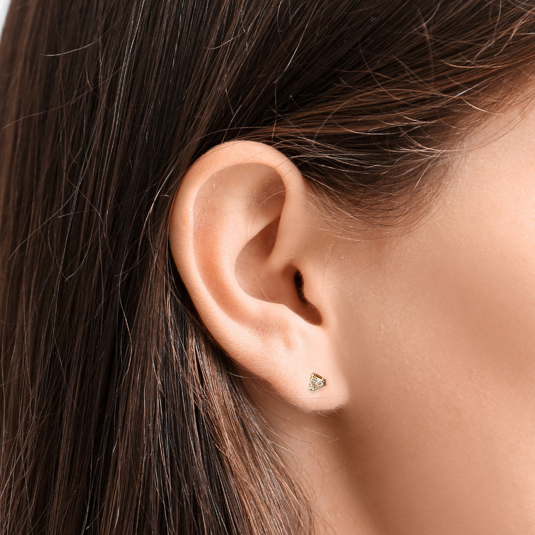 Close-up of an AMANDA PEARL Elements ethical diamond stud earring on a model's ear.
